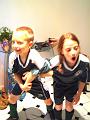 Emily and Alec getting ready for their soccer games-Mothers Day 2008